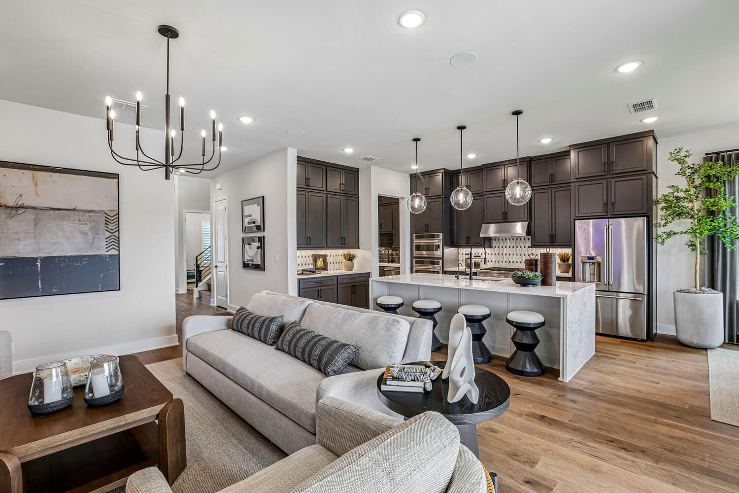 Risewell Homes Model at 441 Resurrection Dr Kitchen with Living Room Photo